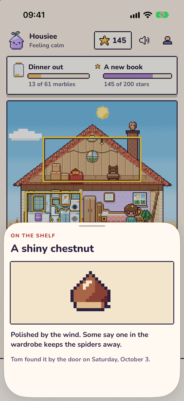On the shelf: A shiny chestnut, polished by the wind, found by the door.